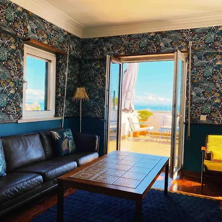 Old Town Rooftops With Sea Views