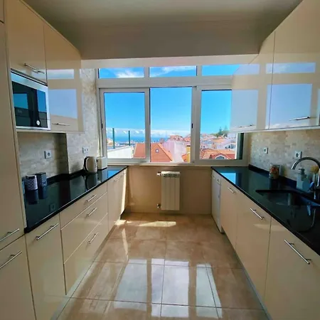 Old Town Rooftops With Sea Views